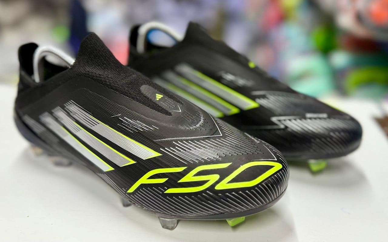 Adidas F50 Football boots with a Lightweight synthetic upper for enhanced speed and agility and High-performance studs designed for superior traction on firm groun