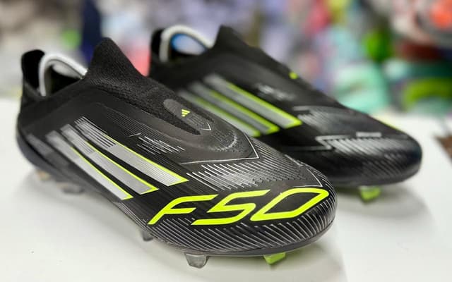 Adidas F50 Football boots with a Lightweight synthetic upper for enhanced speed and agility and High-performance studs designed for superior traction on firm groun