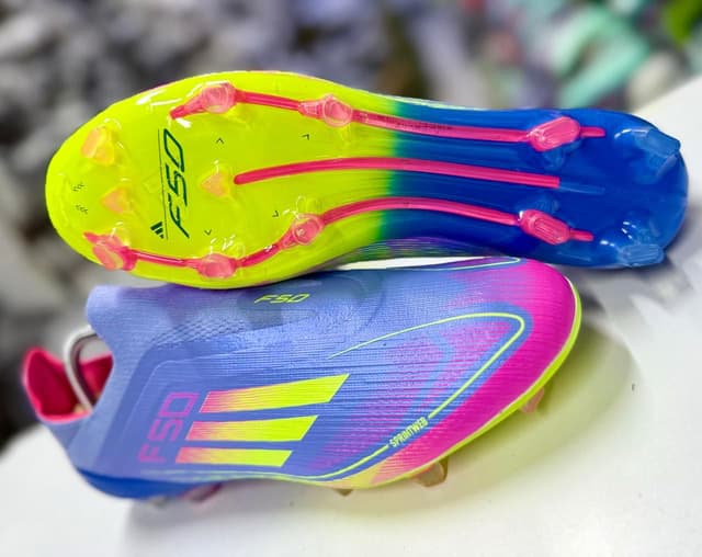 Adidas F50 Football boots with a Lightweight synthetic upper for enhanced speed and agility and High-performance studs designed for superior traction on firm groun