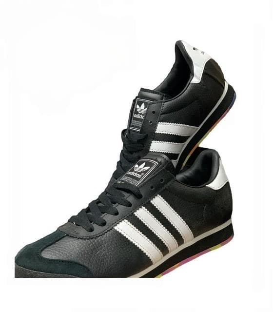 Adidas samoa shoes with a Classic leather upper in white with iconic black serrated 3-Stripes for a timeless, high-contrast retro look.